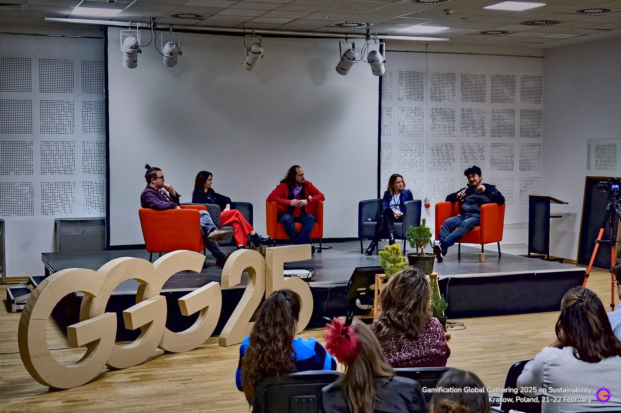 Gamification Global conference panel discussion on stage.