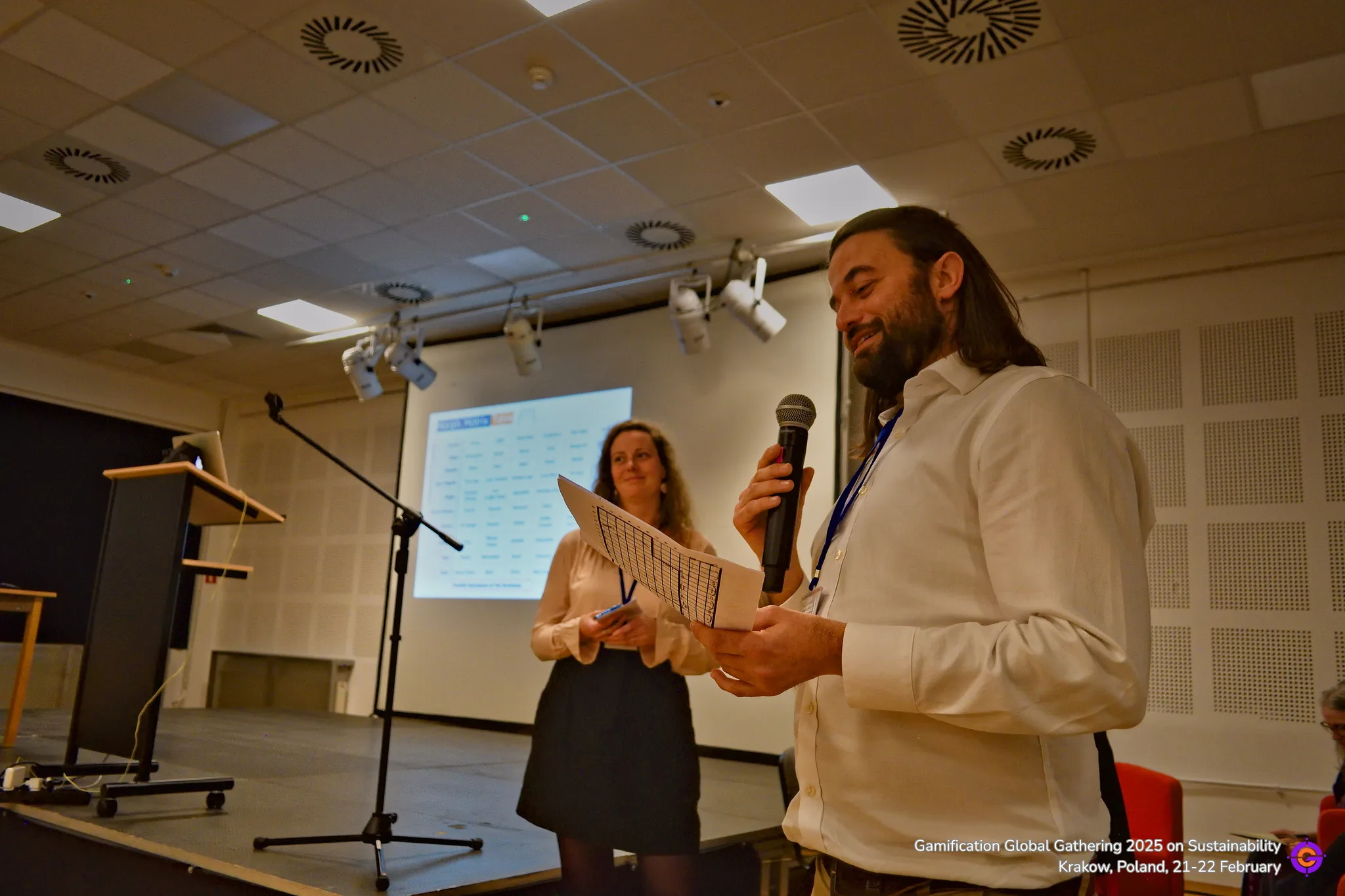 Gamification Global event speakers on stage presentation