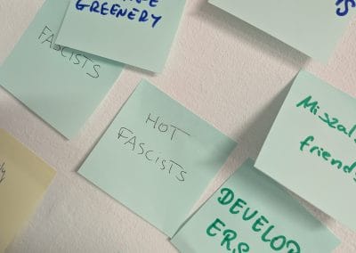 Several sticky notes with various ideas on them